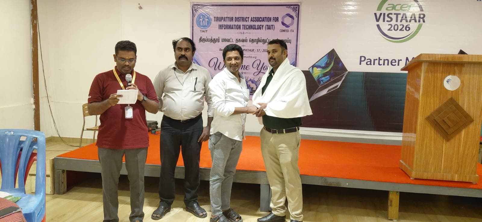 Felicitating a guest at the partner meet